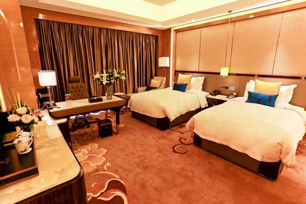 Jinjiang International Hotel Урумчи Номер фото